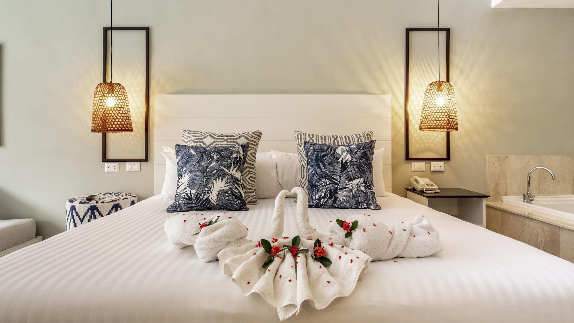 Be Live Collection Punta Cana (Adults Only) Exterior foto A bed with a towel swan